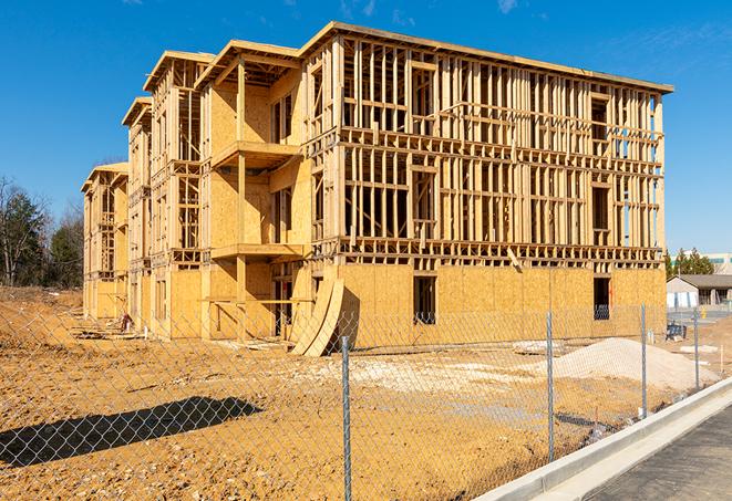 a snapshot of temporary chain link fences protecting a large construction project from unauthorized access in Decatur MS